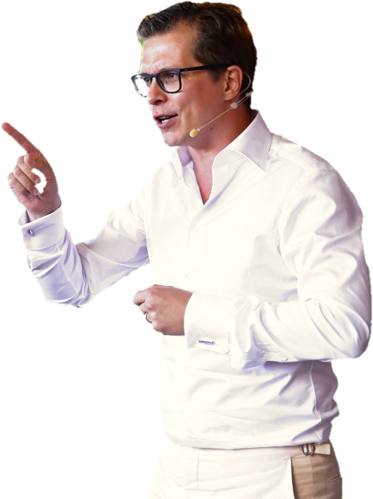 Polle de Maagt on stage, pointing at the room while he explains