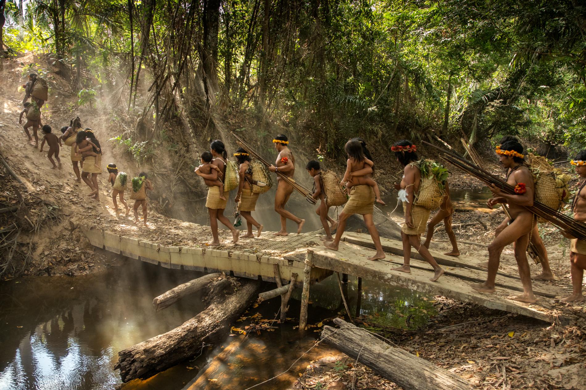 Amazon tribe out hunting. Photo by National Geographic